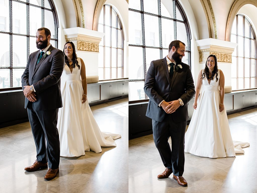 Bride tapping on her groom's shoulder for him to turn around for their first look.