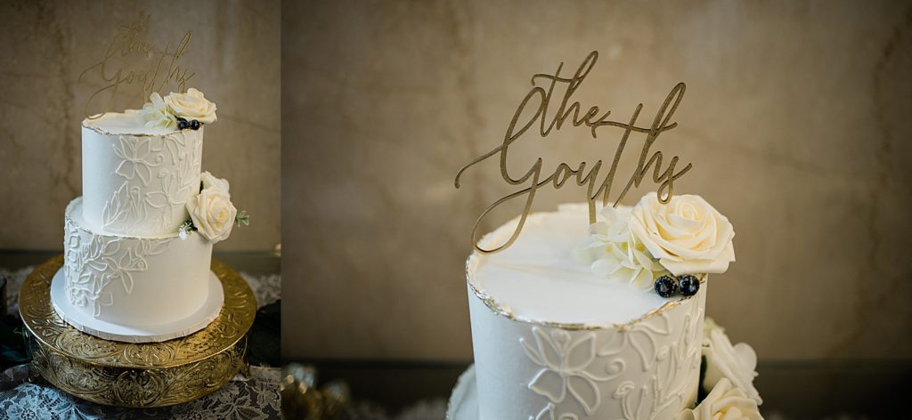 Wedding cake on a gold stand with a custom topper.