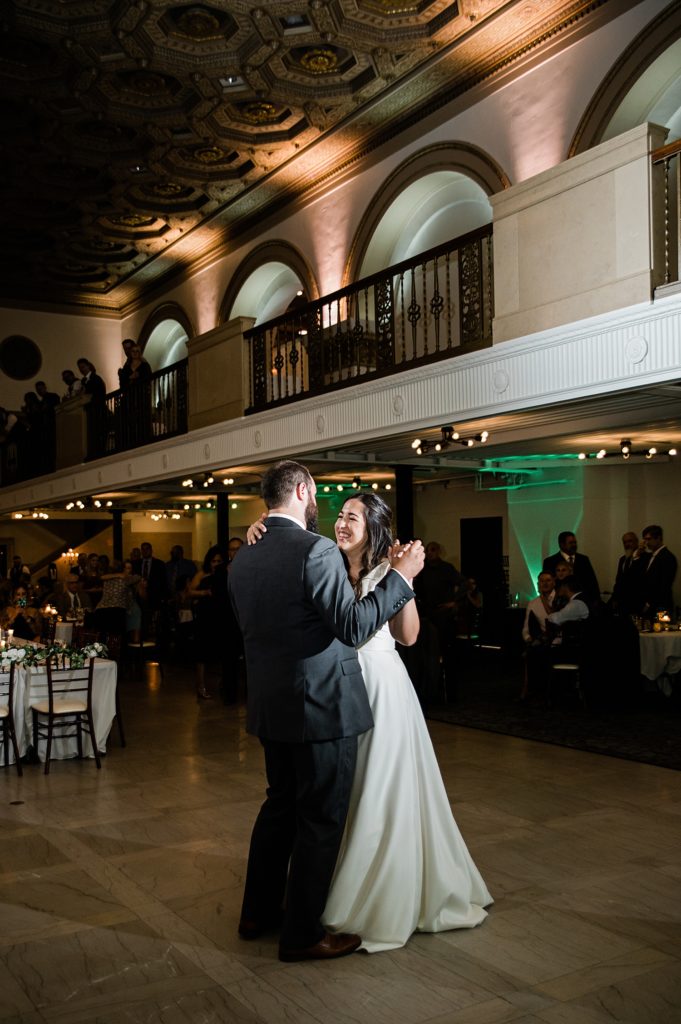 Bride and groom sharing a first dance at their reception for their wedding in Pontiac, Michigan. | Wedding at The Treasury in Pontiac, Michigan.