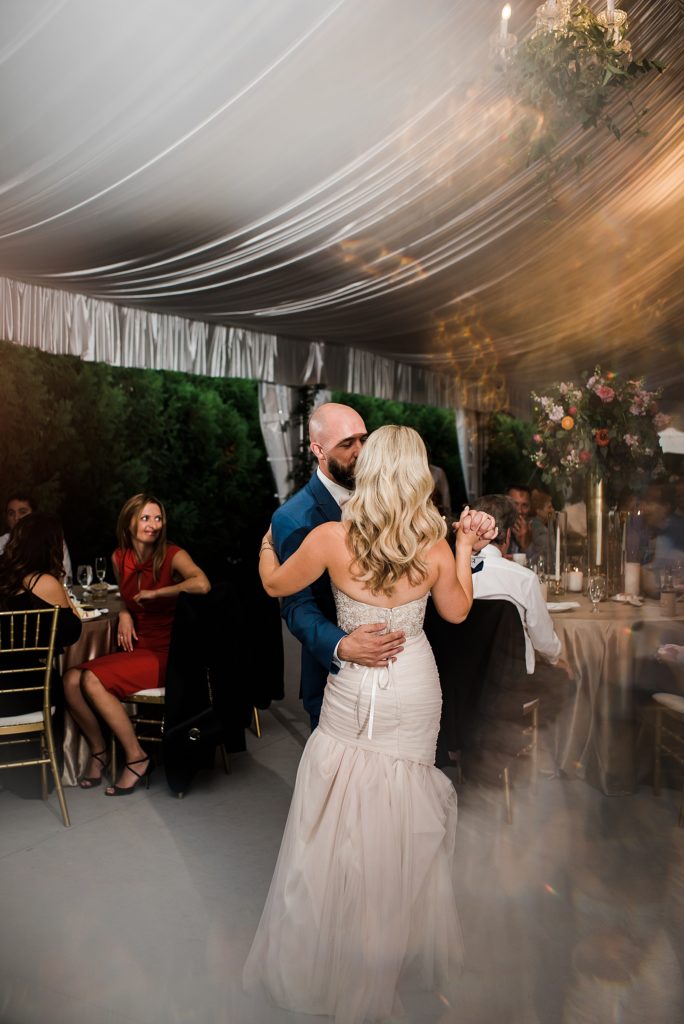 Bride and groom sharing their first dance at The Royal Park Hotel in Rochester Hills.