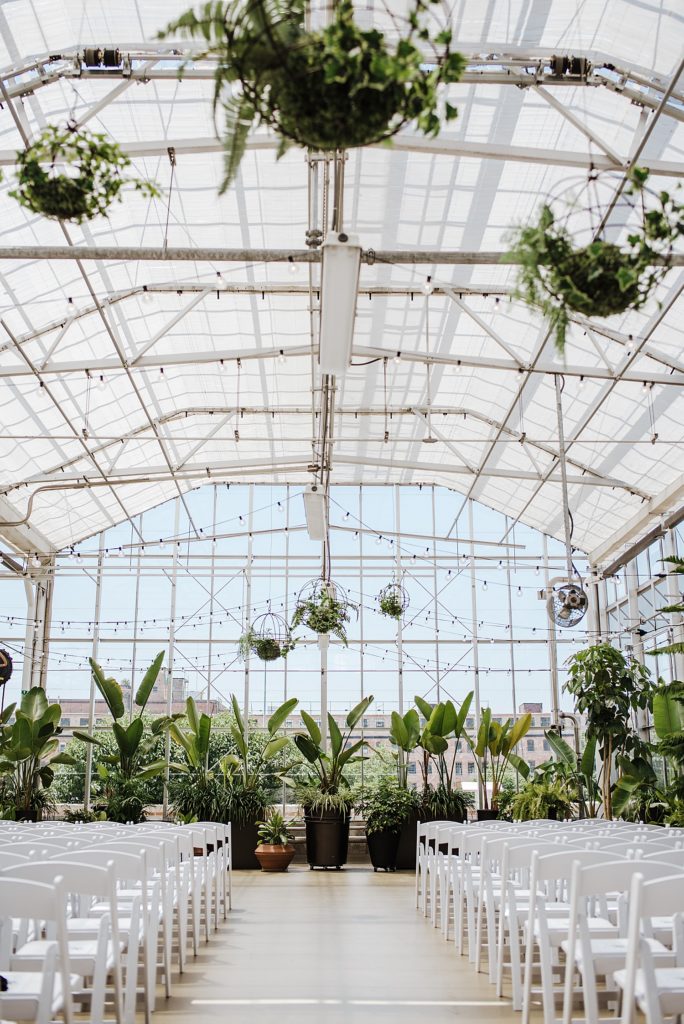 Greenhouse set up for a wedding ceremony at Downtown Market in Grand Rapids.