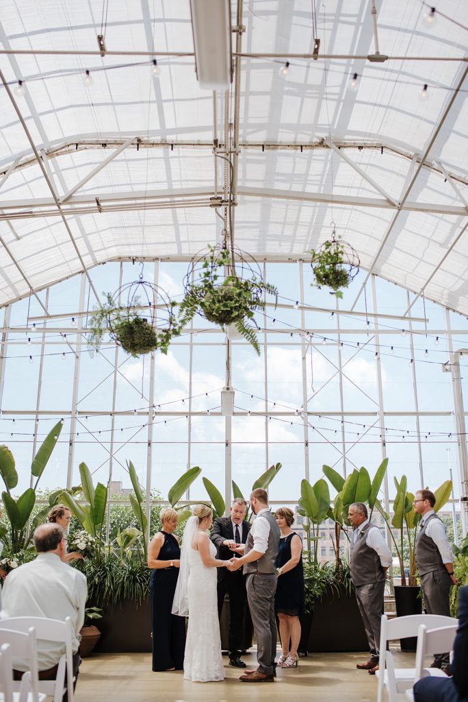 Greenhouse wedding ceremony at Downtown Market in Grand Rapids.