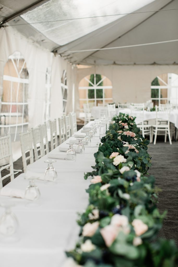 Detail shot of a reception set up under a tent for a Michigan wedding. 