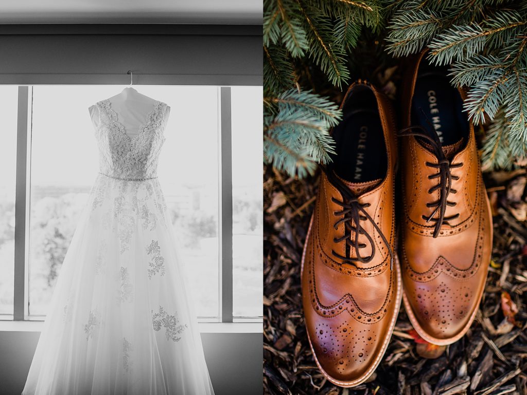 Bridal dress and groom's shoes laid out nicely before this Michigan wedding.