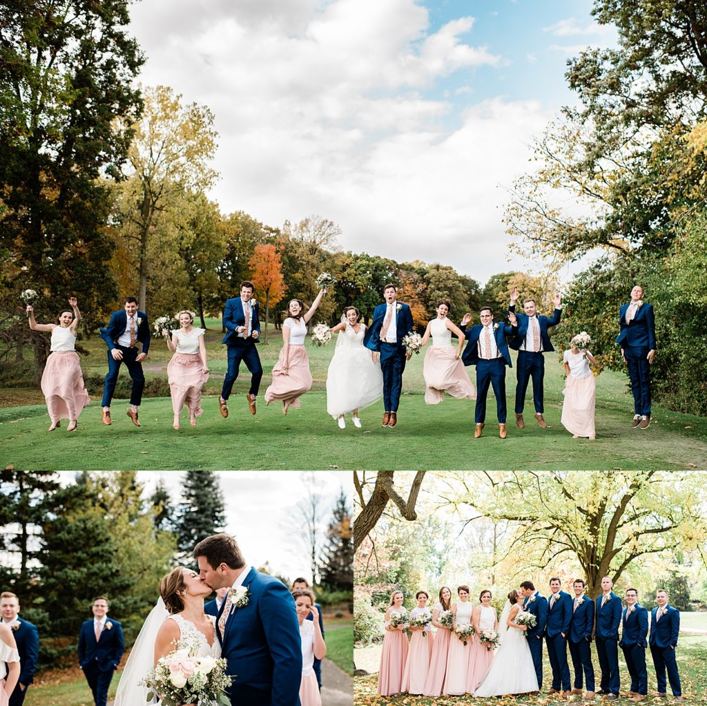 Wedding party in pale pink and navy blue colors outdoors on a lawn at Pine Trace Golf Course wedding venue.