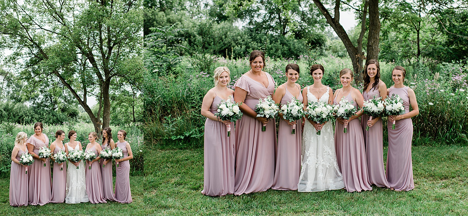 Bride and bridesmaids wearing blush dresses holding white green floral bouquets with Michigan wedding photographer