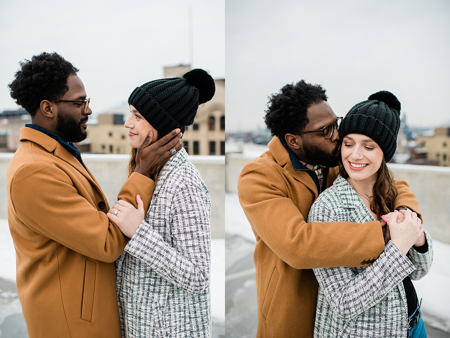 Engaged couple shows of engagement ring while standing on top of parking garage