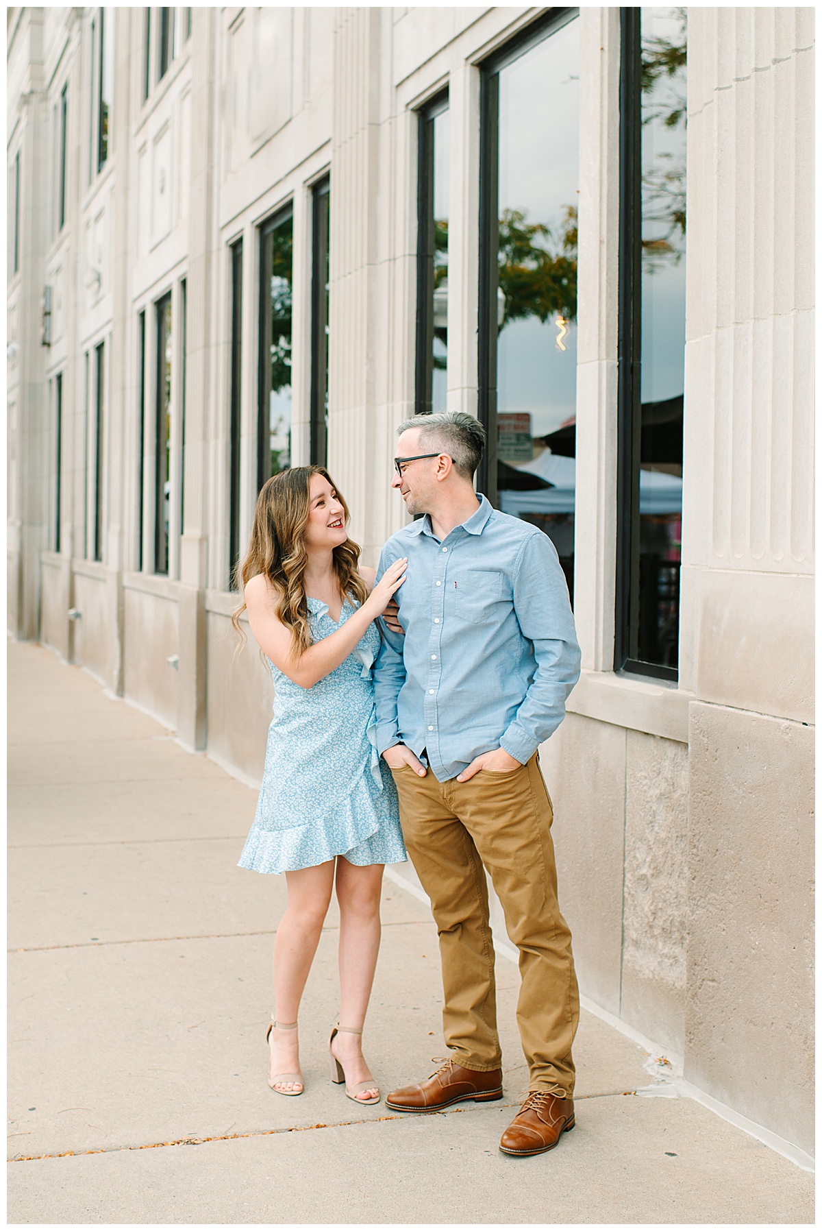 Woman and man look at each other for Michigan Wedding Photographer