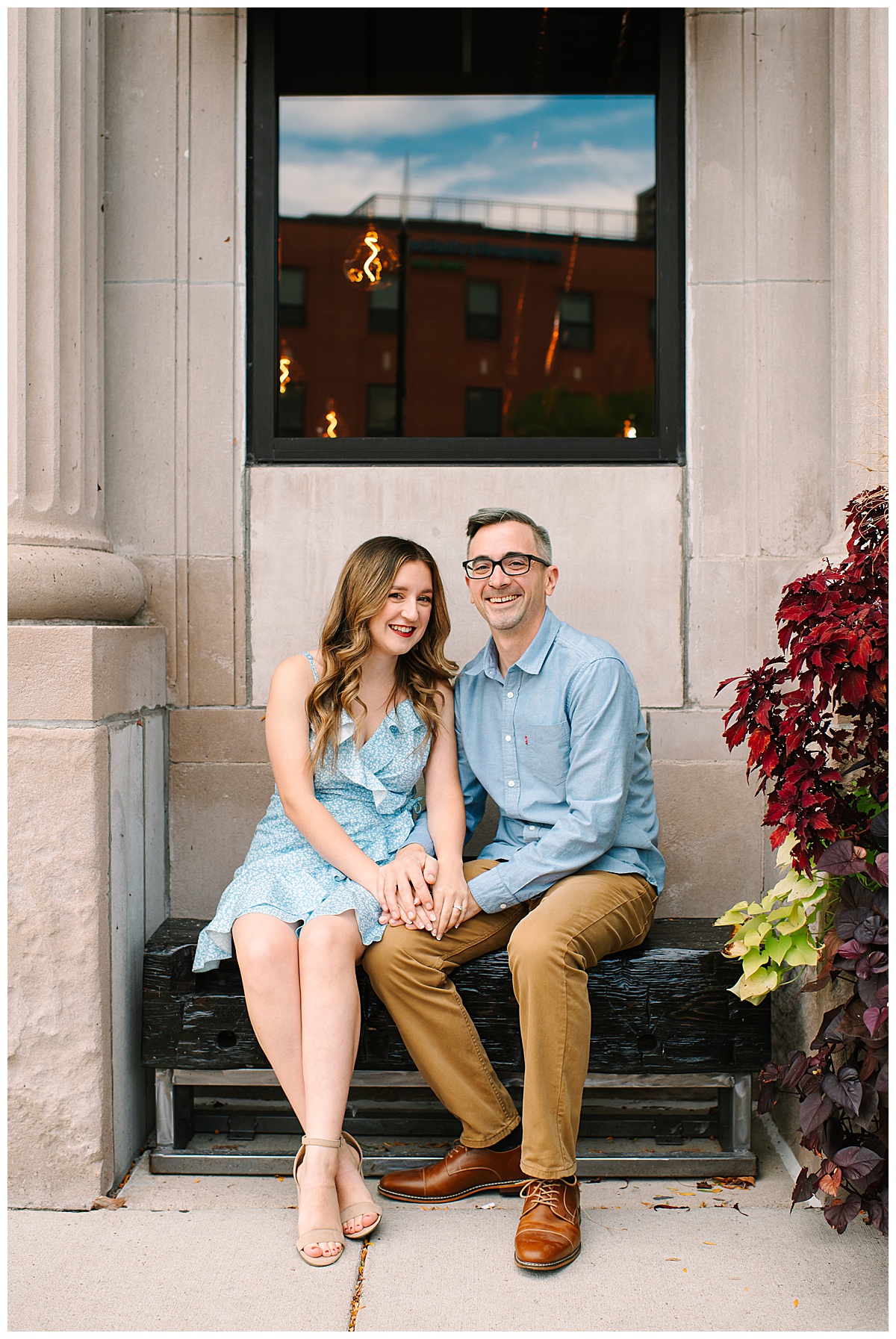 Woman and man smile together for Wyandotte engagement session