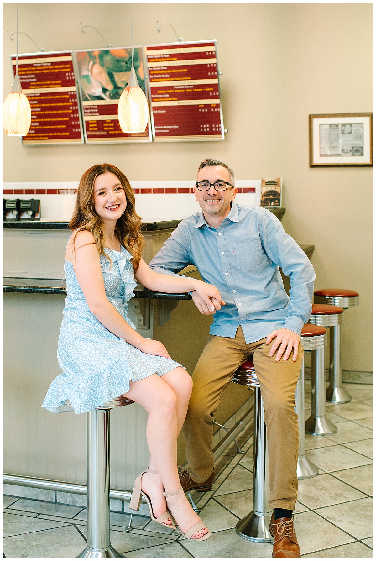 Couple sit at diner for Wyandotte engagement session