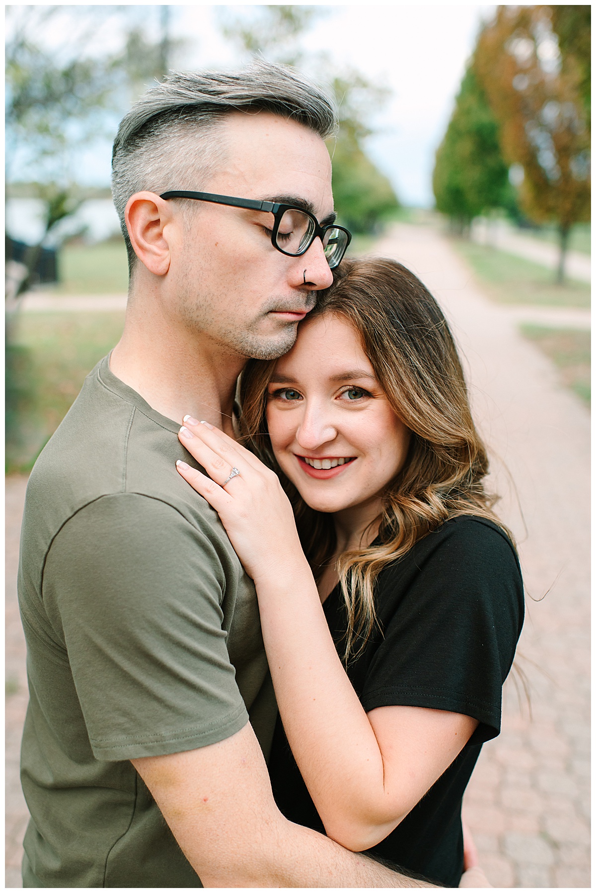 Engaged couple hold each other close for Brittany Emerson Photography