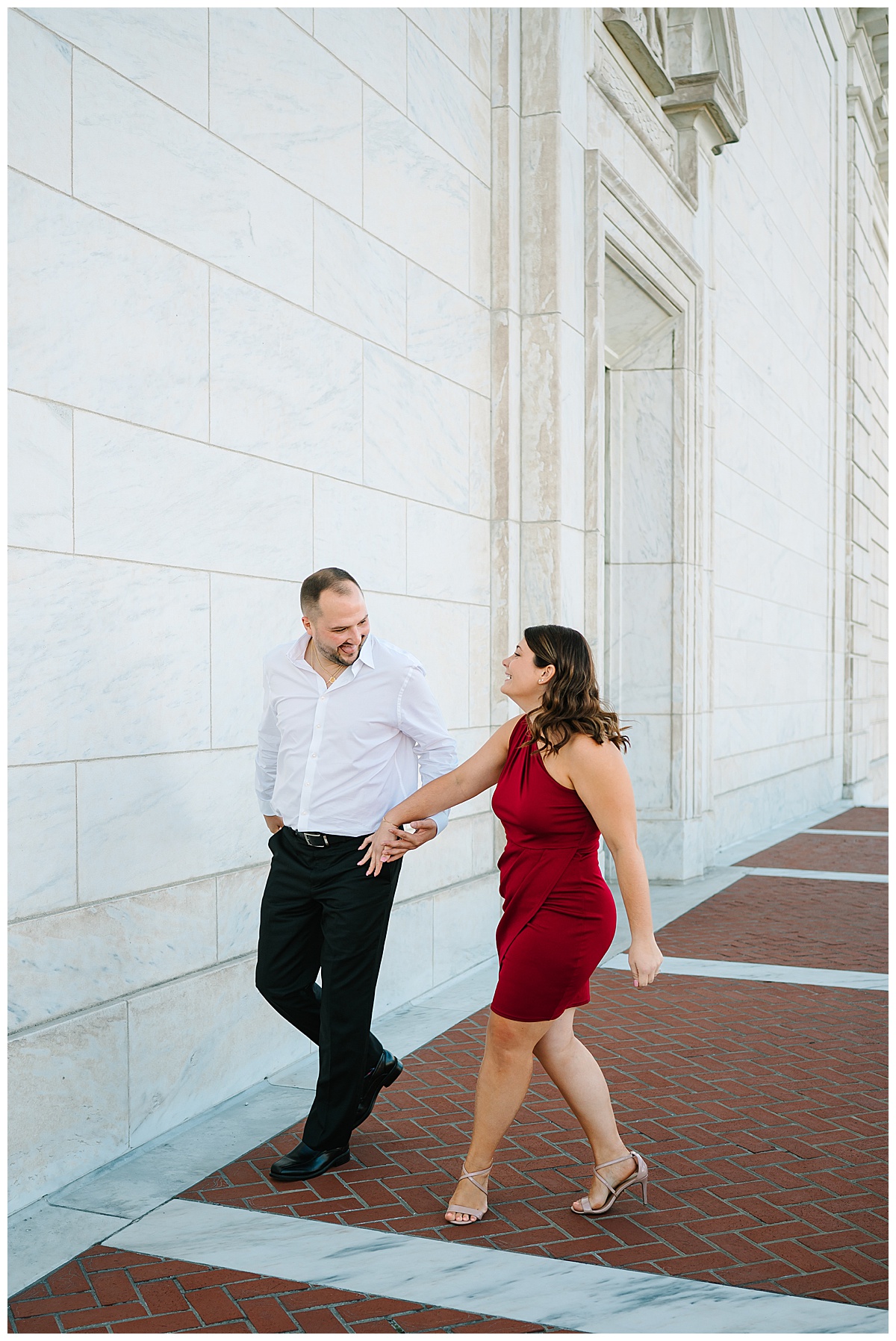 Engaged couple laugh together for Detroit Engagement Session
