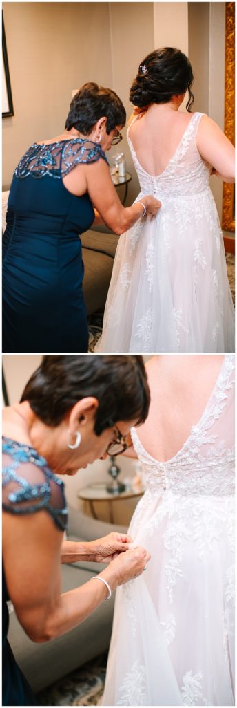 Mother adjusting brides dress for Brittany Emerson Photography