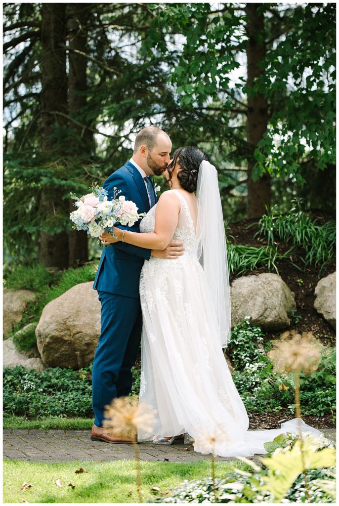 Couple kissing at Fox Hills Golf Club