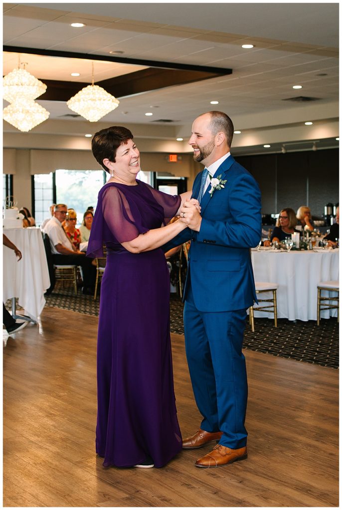 Groom dancing with mother at Fox Hills Golf Club