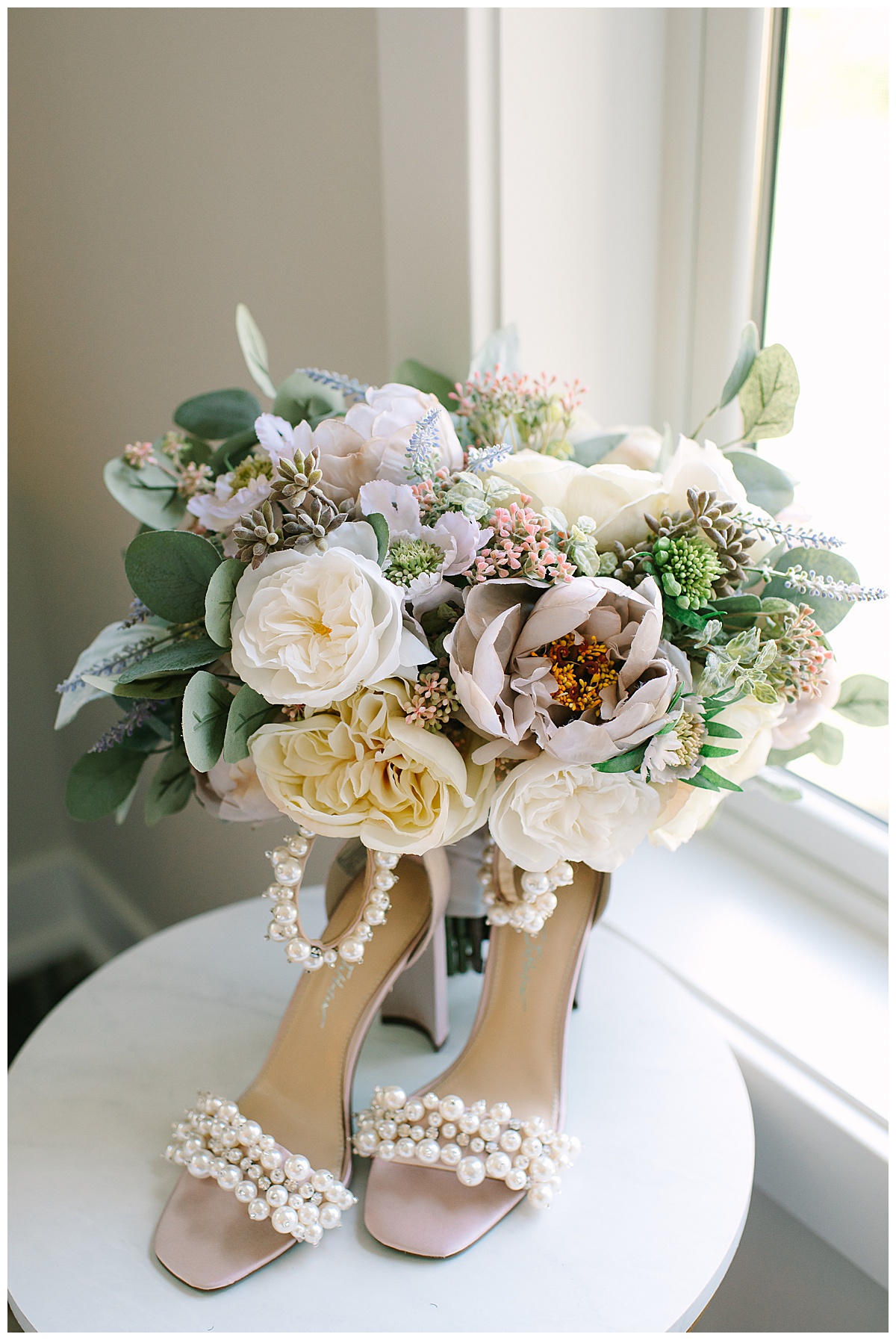 Beautiful florals and shoes by Michigan Wedding Photographer