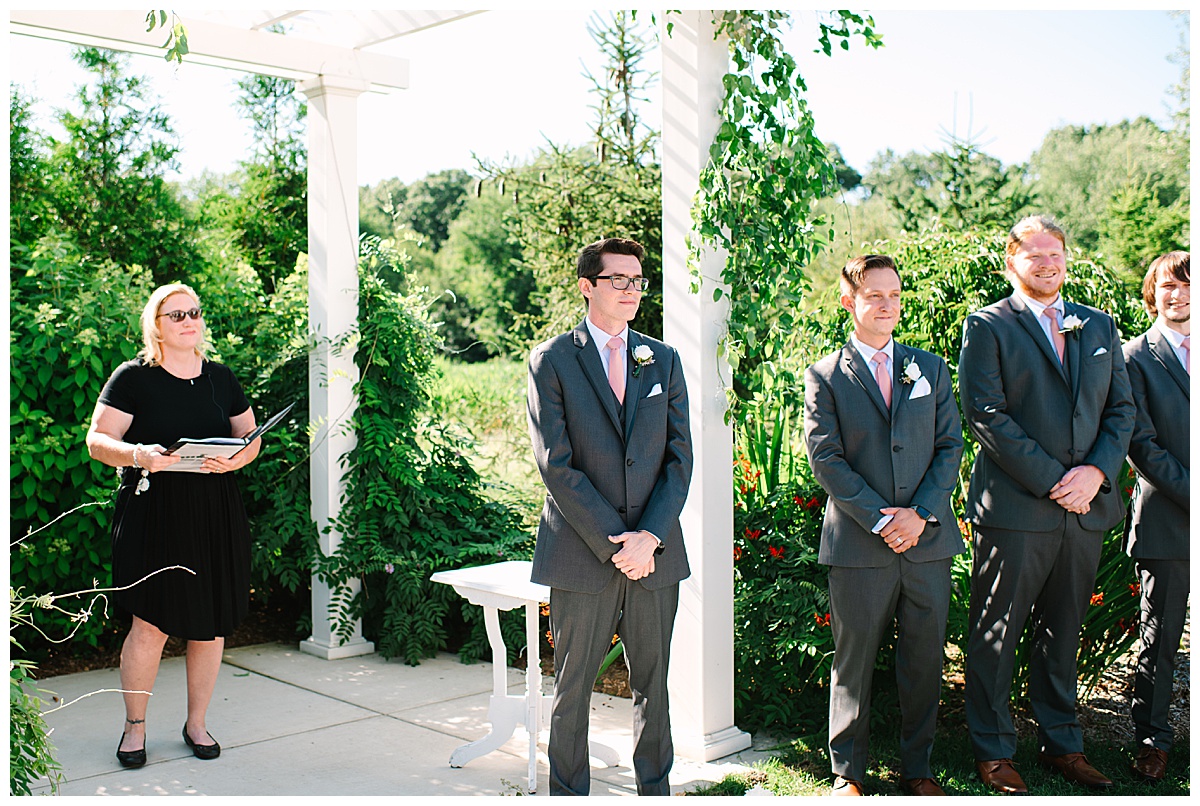 Groom sees bride by Brittany Emerson Photography