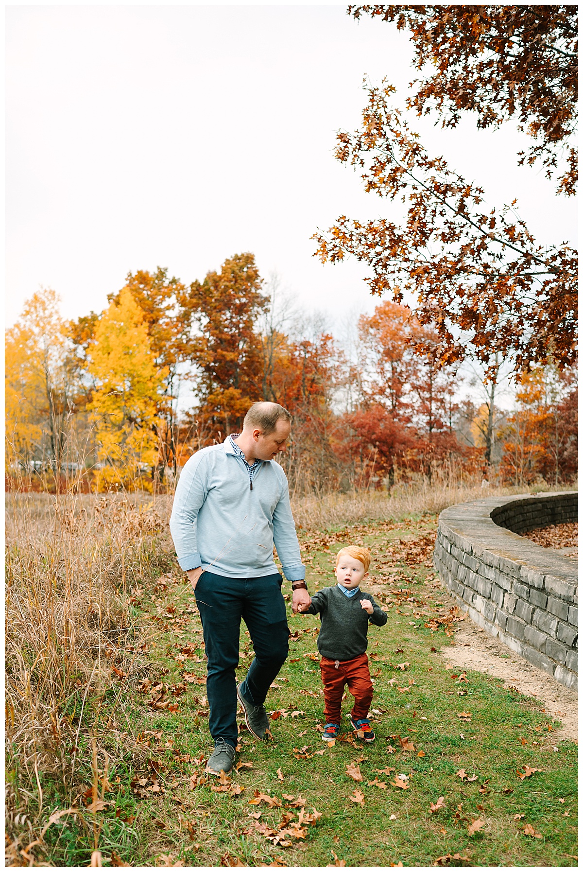 Dad walks with son for Brittany Emerson Photography