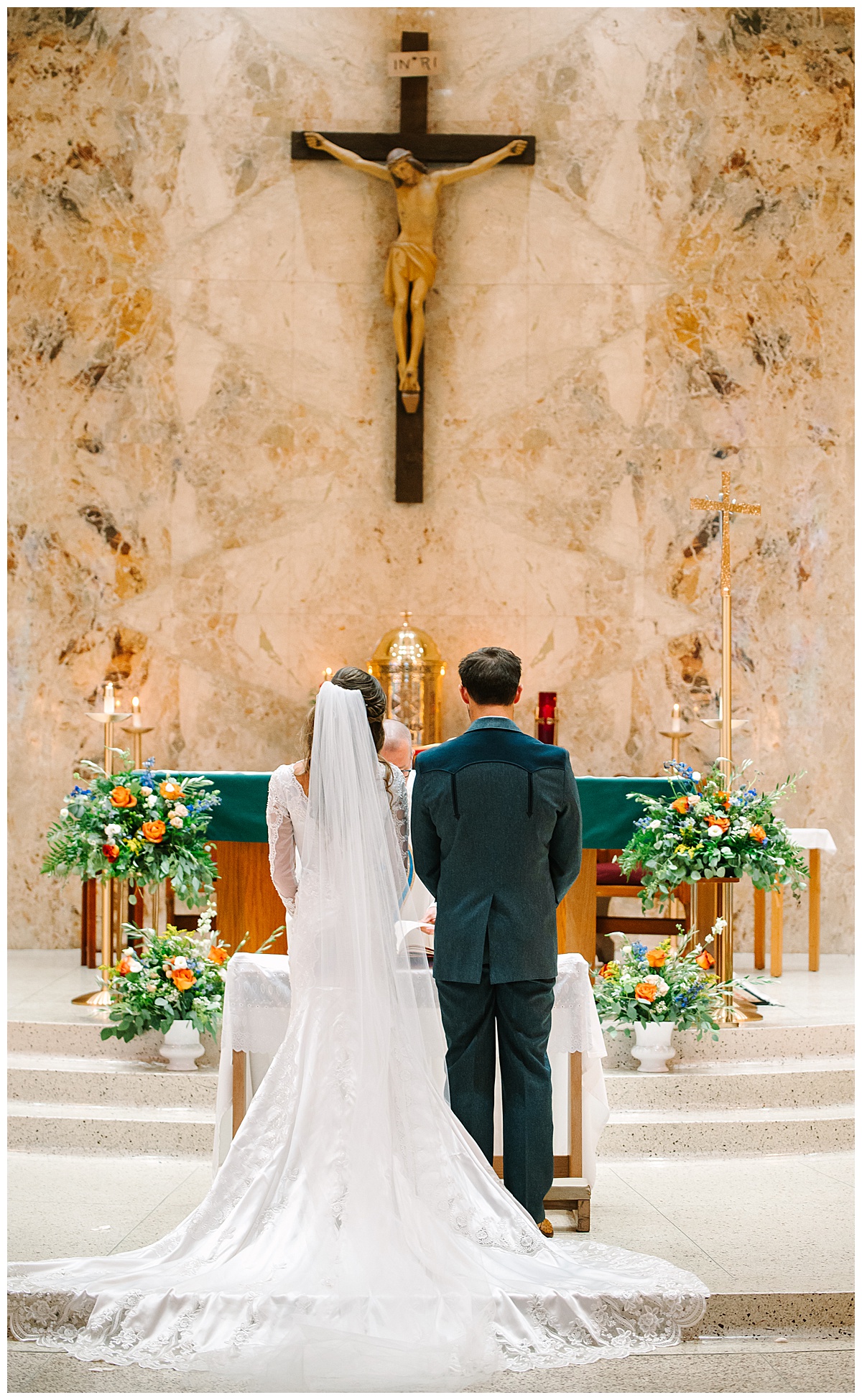 Bride and groom stand in church for Michigan Wedding Photographer