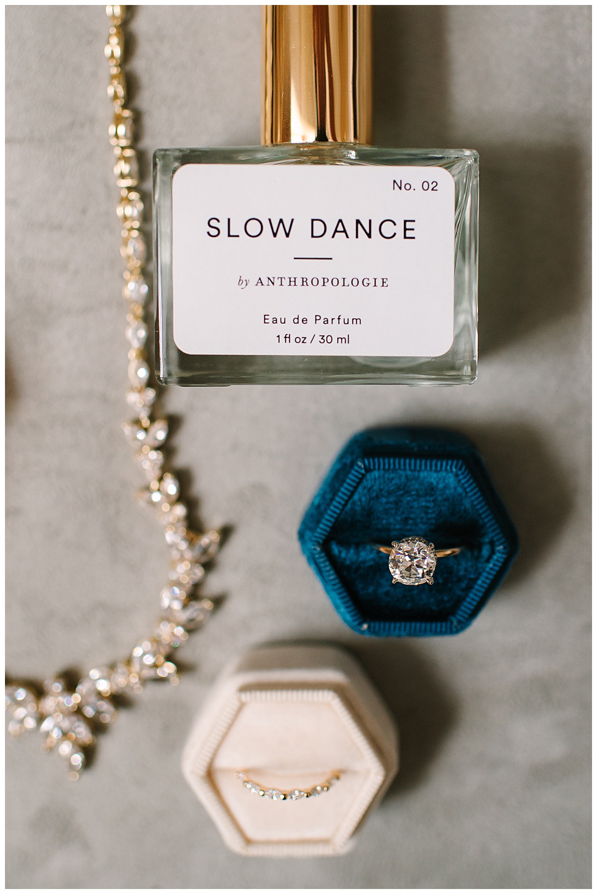 Ring and perfume by Michigan Wedding Photographer