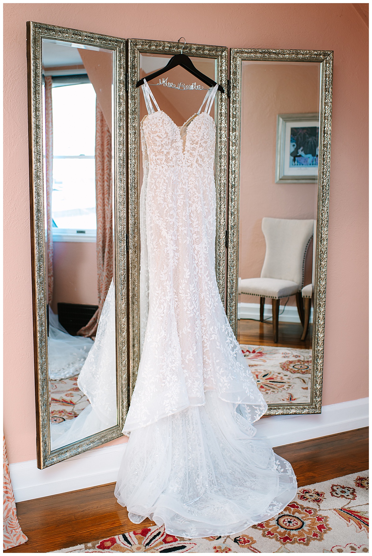 Beautiful bridal gown on mirror before  Glen Oaks wedding