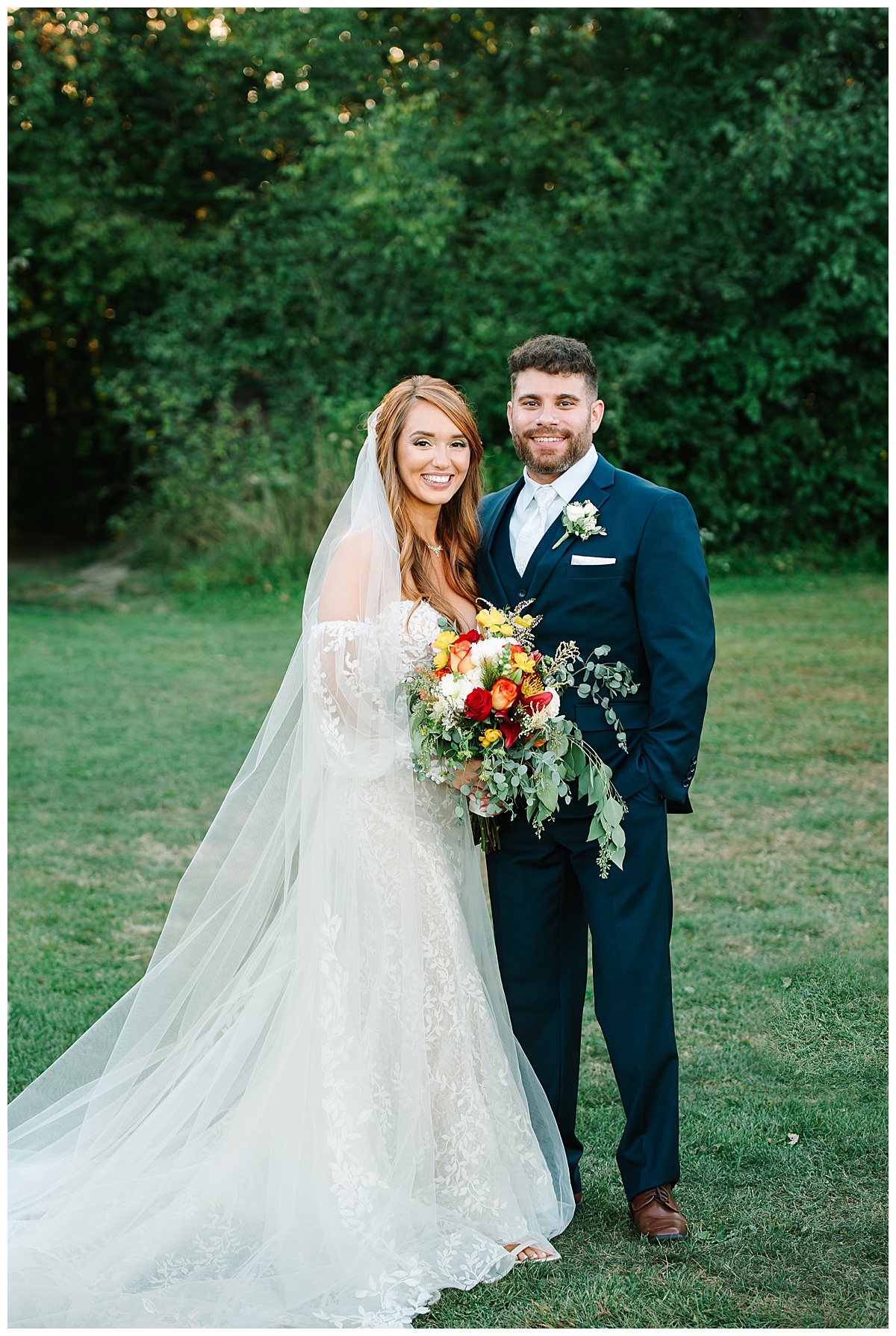 Husband and wife smile together for Michigan Wedding Photographer